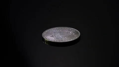 Silver Bitcoin on Black Background, Rotation Close-up Stock Footage 87800941