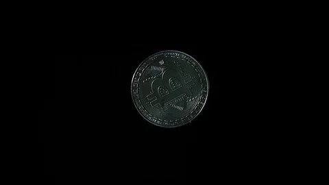 Silver Bitcoin on Black Background, Rotation Close-up Stockbeeldmateriaal 87801033