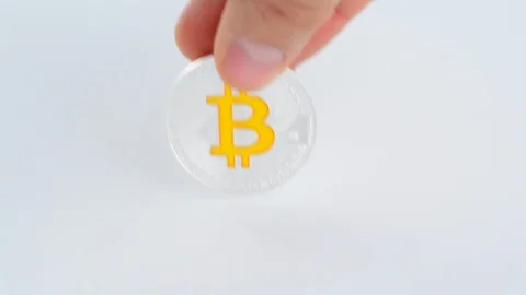 Silver bitcoin BTC coin. Stock Footage 99548125