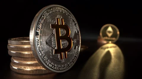 Silver Bitcoin BTC on the foreground and silver Etherium ETH with beautiful Video stock 129865854