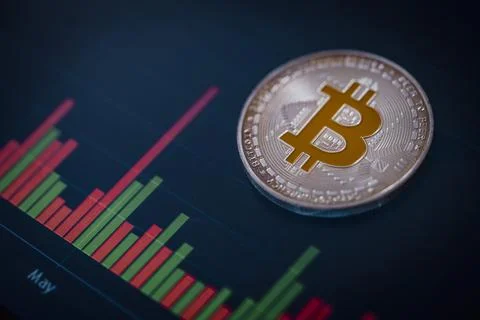 Silver Bitcoin with candle stick graph chart and digital background Stock Photos