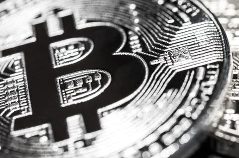 Silver bitcoin closeup. Macro. Stock Photos