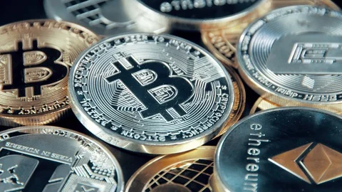 SIlver Bitcoin coin on black background. Silver Crypto coin on spinning stand. 스톡 동영상 126908596