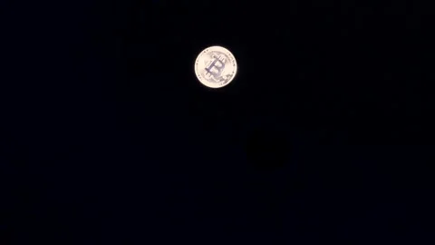 Silver Bitcoin flipping in air in slow motion Stock Footage 217947241