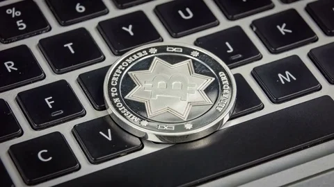 Silver bitcoin on keyboard. Close up rotation. Macro shot 4k Video stock 79124155