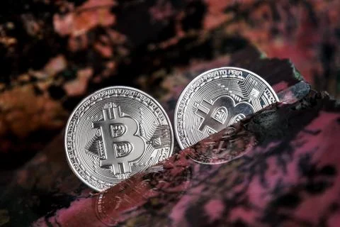 Silver bitcoin in the stone Foto stock
