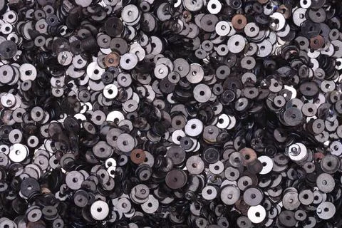 Silver, black sequin close-up on a background Copyright: xNehaxSadaye/Dino... Stock Photos