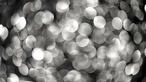 Silver Bokeh Fading On Black. Видео 237784910