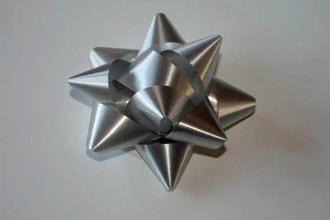 Silver Bow. Stock Photos