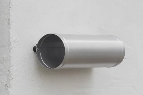 A silver box for newspapers on the wall Foto stock