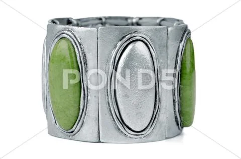 Silver bracelet with green gemstones Stock Photos