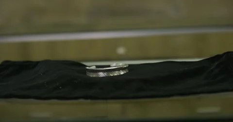 Silver bracelets on table Stock Footage 141359794