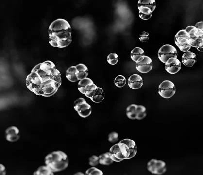 The silver bubbles from the bubble blower Stock Photos