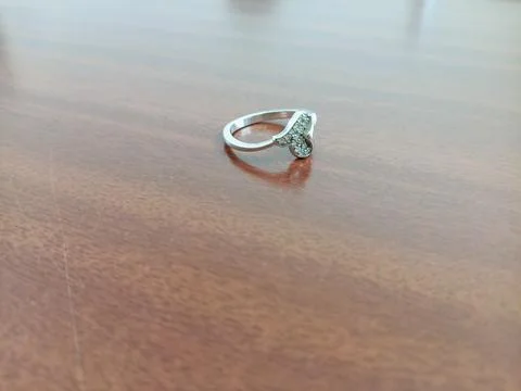 Silver butterfly shaped ring with small clear stones Stock Photos