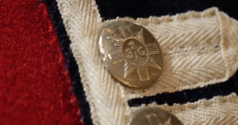 Silver button colonial red coat English jacket resolution era close up   Stock Footage 171194730