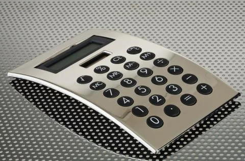 Silver calculator on the grid Stock Photos