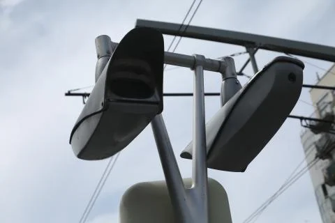 Silver CCTV Camera. Protection security system watching people Stock Photos