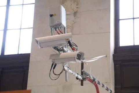 Silver CCTV Camera. Protection security system watching people Stock Photos