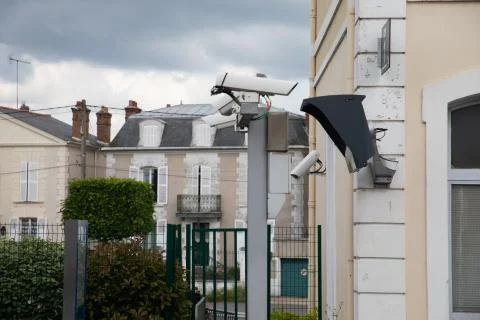 Silver CCTV Camera. Protection security system watching people Stock Photos