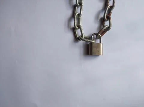 Silver chain and lock Stock Photos