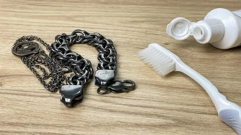 Silver chains before home cleaning Stock Photos