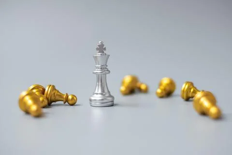Silver Chess king figure stand out from crowd of enermy or opponent. Strate.. Stock Photos