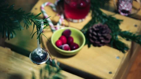 Silver Christmas bauble on tree with red cranberry festive background Stock Footage 325448664