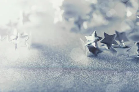 Silver Christmas composition with tiny stars sparkling Stock Photos