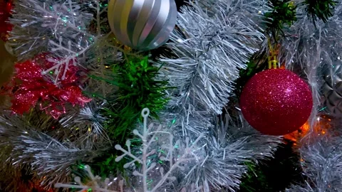 Silver christmas tree decorations with red and silver decorative balls hanging Stock Footage 264914092