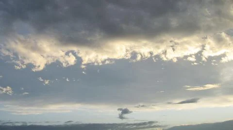 Silver clouds over Yakutia. Stock Photos