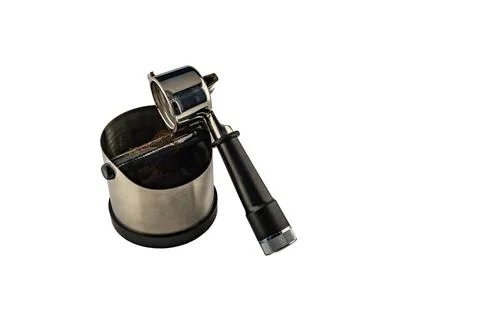 Silver coffee tap, grounds container, coffee machine accessories Stock Photos