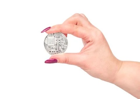 Silver coin bitcoin in hand Stock Photos