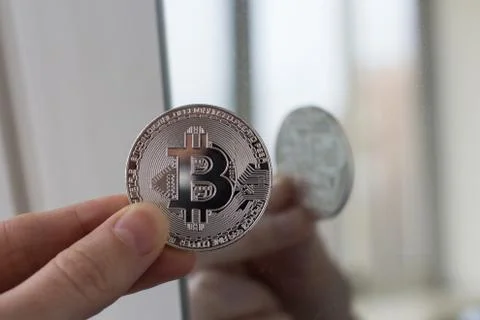 Silver coin of bitcoin Foto stock