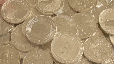 Silver coin in consideration under a magnifying glass,, 2020, Russia, Moscow Stock Footage 142872039