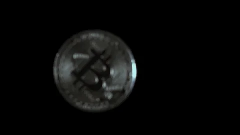 Silver coin falls down on black slow motion Stock Footage 85472859
