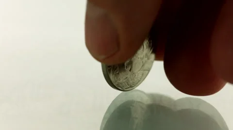 Silver coin spinning on white background Stock Footage 46662676