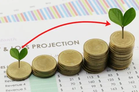 Silver coin stack and arrow line and have treetop in business growth concept. Stock Photos