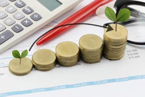 Silver coin stack and arrow line and have treetop in business growth concept. Stock Photos
