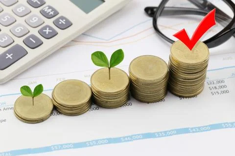 Silver coin stack of business graph and have treetop in business growth con.. 스톡 사진