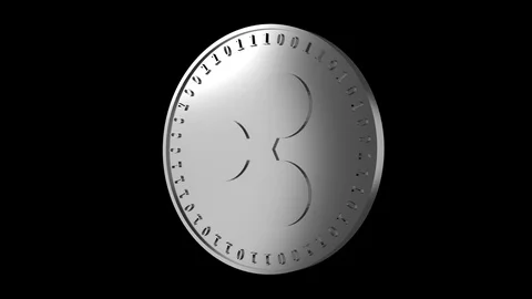 Silver coin with the symbol of digital crypto currency Ripple Stock Footage