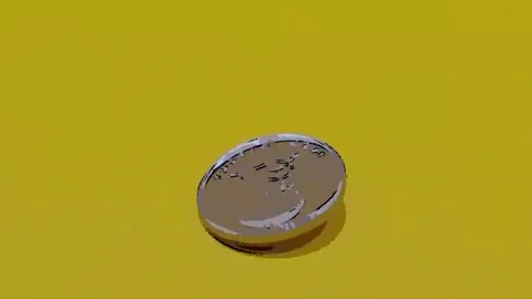 A silver coin on a yellow background, close up Stock Footage 333915174