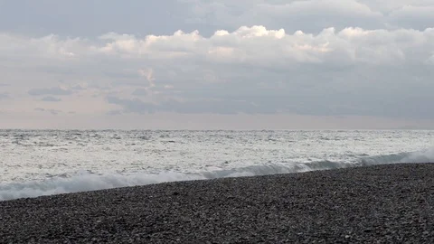 The silver-colored sea with its waves Stock Footage 97782089