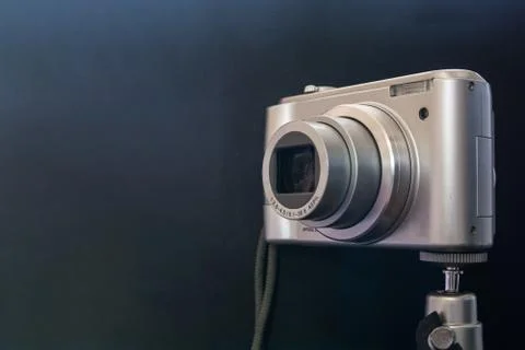 Silver compact digital photo camera. Stock Photos