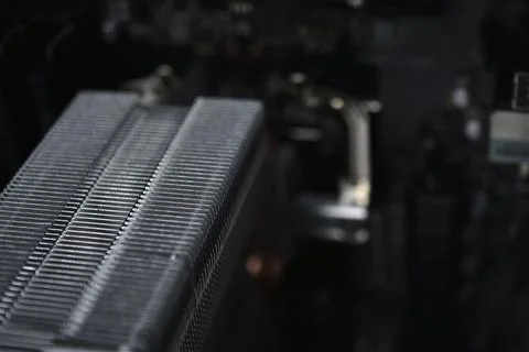 Silver computer processor on a black motherboard 스톡 사진