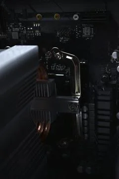 Silver computer processor on a black motherboard Foto stock