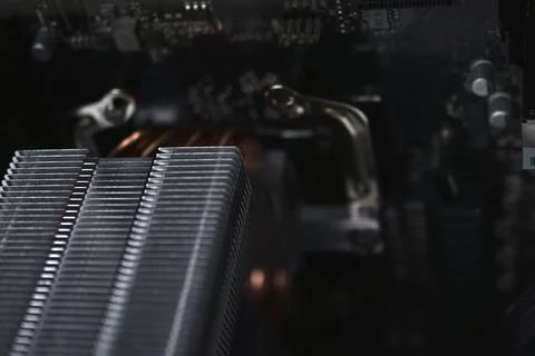 Silver computer processor on a black motherboard 스톡 사진