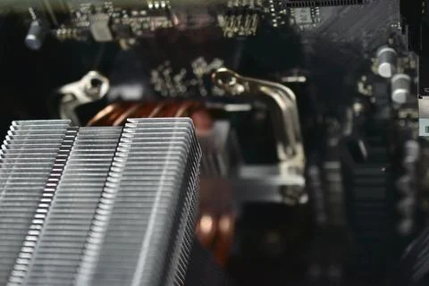 Silver computer processor on a black motherboard 写真素材