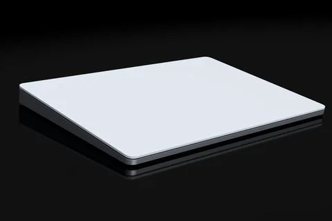 Silver computer trackpad or wireless touch pad isolated on black background Stock Photos