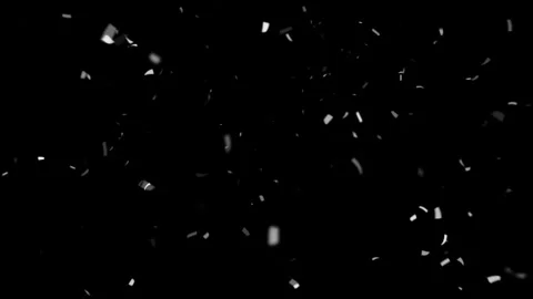 Silver confetti pieces exploding outward from center isolated on black Stock Footage 327594566