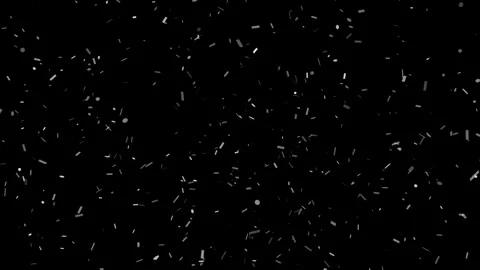 Silver confetti pieces falling down on dark background slowly Stock Footage 327594787